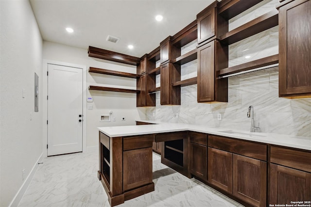 334 Dulce Vis, Boerne, TX 78006 - kitchen featuring open shelves, a sink, tasteful backsplash, dark brown cabinets, and recessed lighting