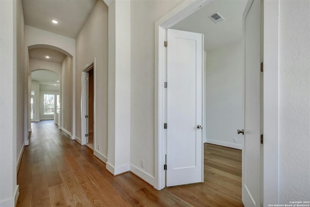 hallway featuring light hardwood / wood-style floors