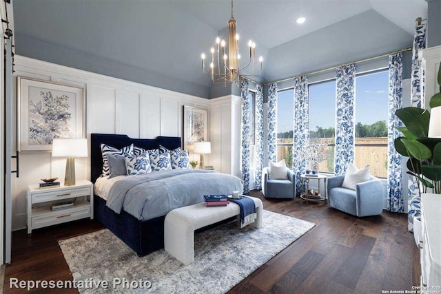 bedroom featuring dark wood-type flooring and a chandelier