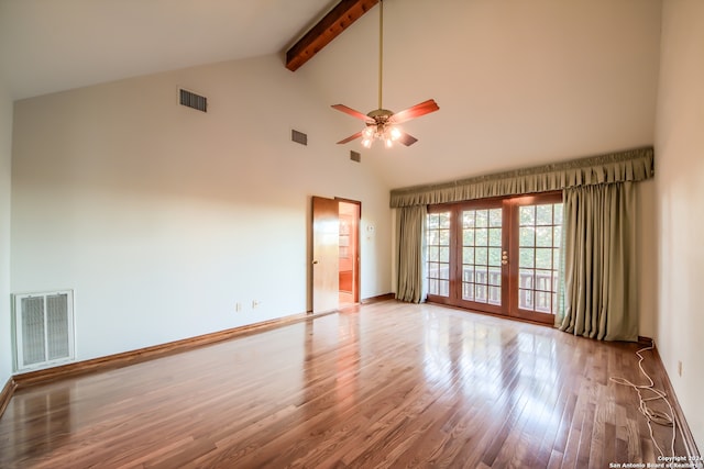 empty room featuring hardwood / wood-style floors, high vaulted ceiling, french doors, ceiling fan, and beamed ceiling