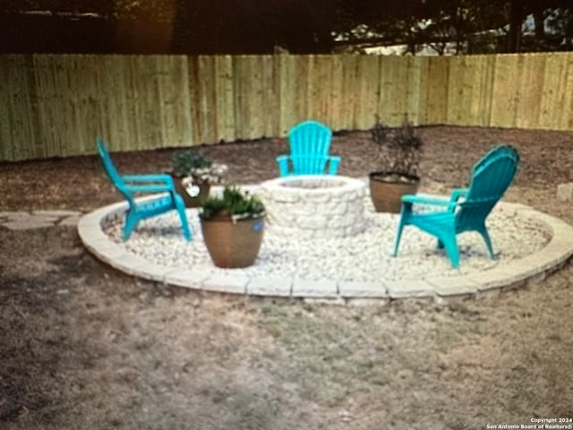 exterior space featuring a fire pit