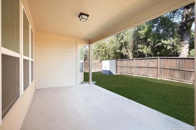 view of patio / terrace with a storage unit