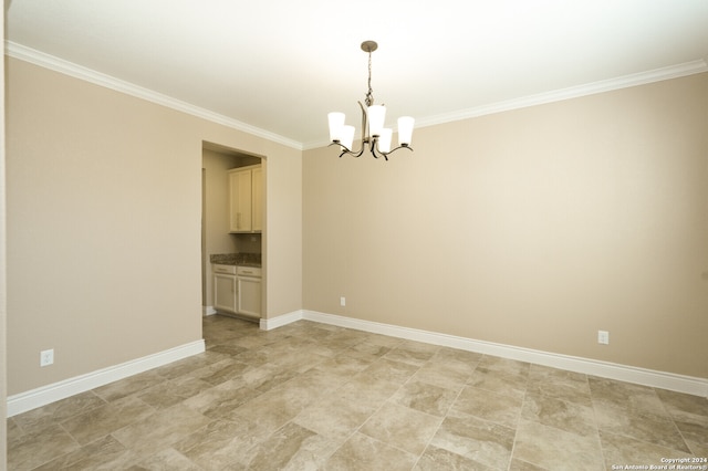 unfurnished room with a notable chandelier and ornamental molding