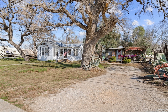 view of front of house with a front lawn