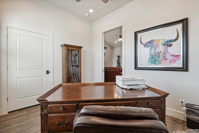 office with ceiling fan, dark hardwood / wood-style flooring, and lofted ceiling