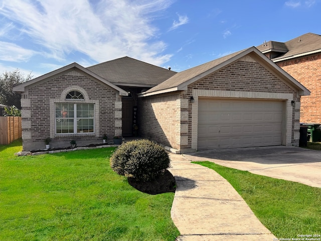 ranch-style house featuring a garage and a front lawn