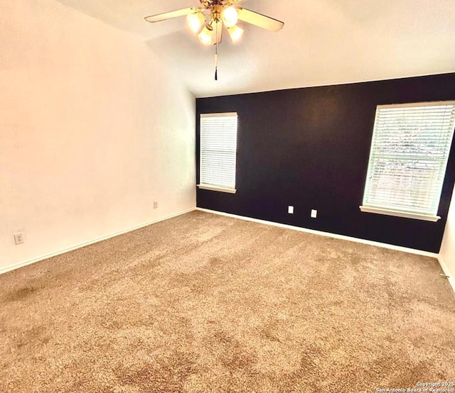 6050 Lakefront, San Antonio, TX 78222 - carpeted empty room featuring a ceiling fan and baseboards