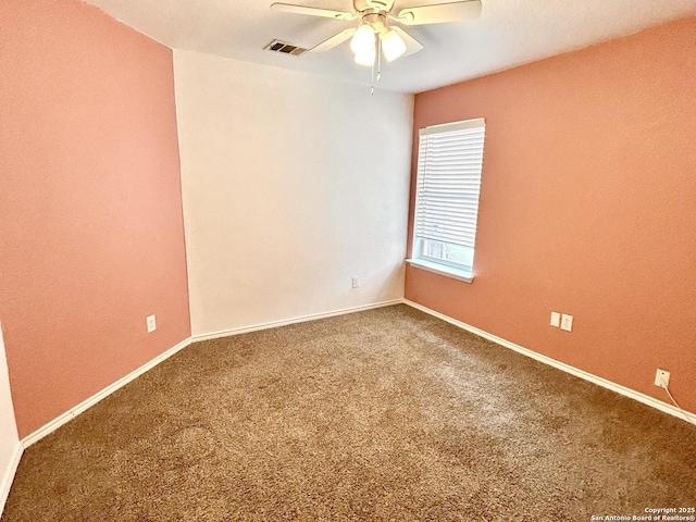6050 Lakefront, San Antonio, TX 78222 - carpeted spare room featuring a ceiling fan and baseboards