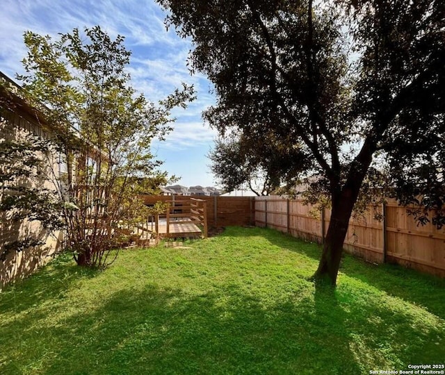 6050 Lakefront, San Antonio, TX 78222 - view of yard featuring a deck