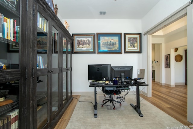 office area featuring hardwood / wood-style floors