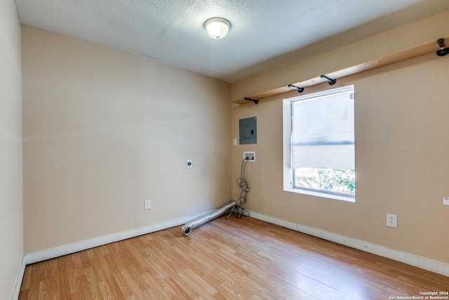 125 Forrest Ave, San Antonio, TX 78204 - empty room featuring wood finished floors, baseboards, and electric panel