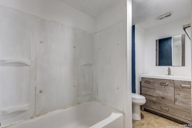 125 Forrest Ave, San Antonio, TX 78204 - bathroom with toilet, vanity, tile patterned floors, and shower / washtub combination