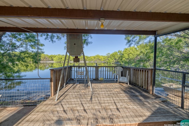 view of patio with a water view