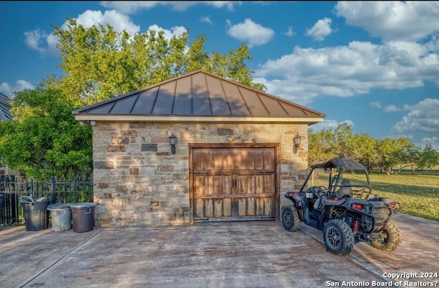 view of outdoor structure featuring a garage