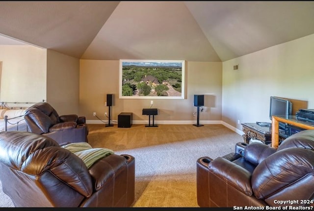 carpeted living room featuring vaulted ceiling