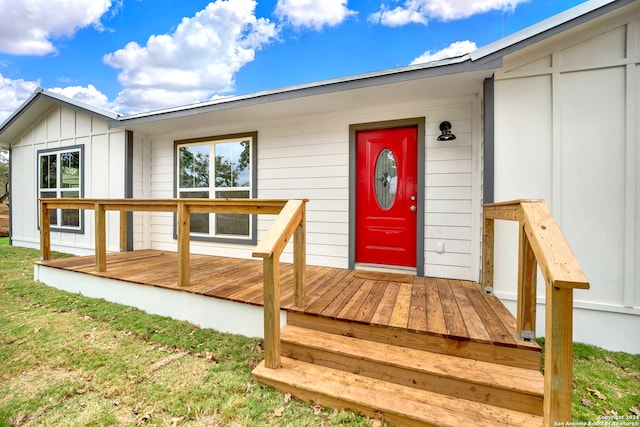 doorway to property featuring a deck