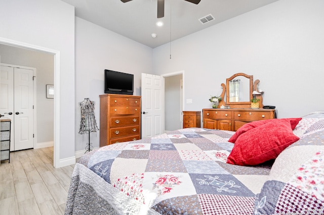 bedroom featuring high vaulted ceiling, ceiling fan, and light hardwood / wood-style floors