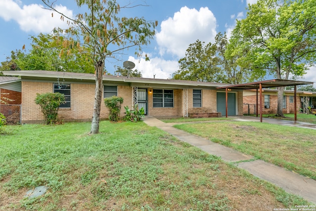 single story home featuring a front yard and a carport