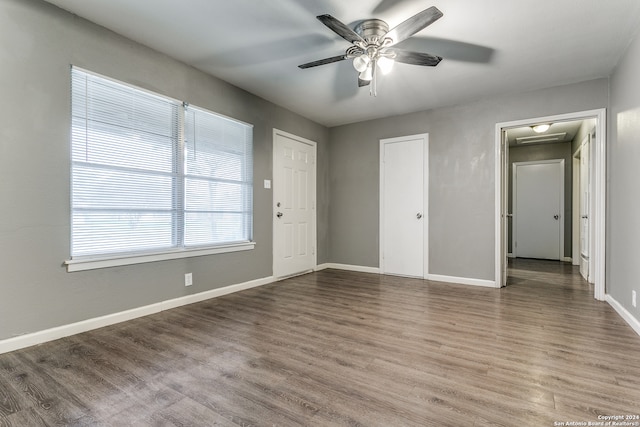 interior space featuring ceiling fan and hardwood / wood-style flooring