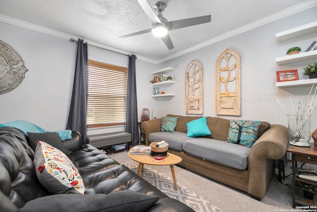 carpeted living room featuring ceiling fan, ornamental molding, and a textured ceiling