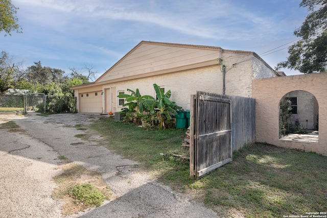 view of home's exterior featuring a garage