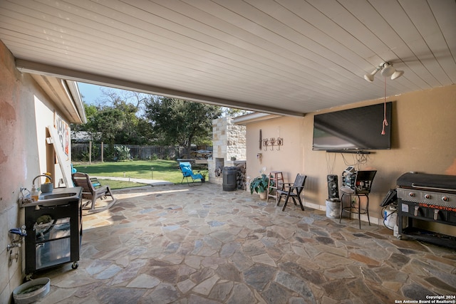 view of patio with a grill