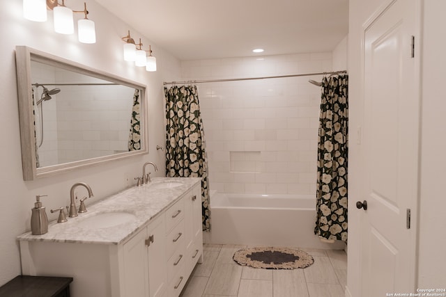 bathroom with tile patterned floors, shower / bath combo, and vanity