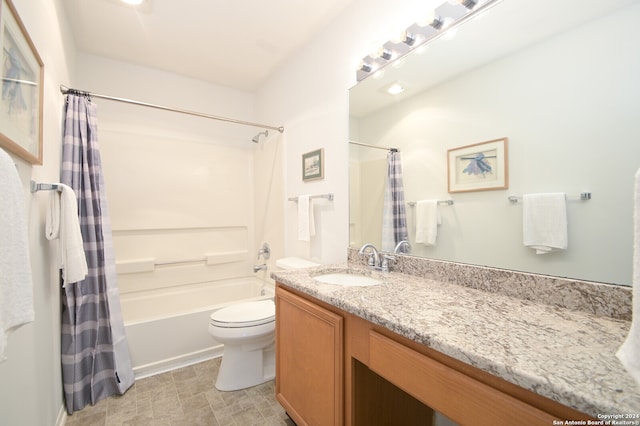 full bathroom featuring vanity, toilet, and shower / bathtub combination with curtain