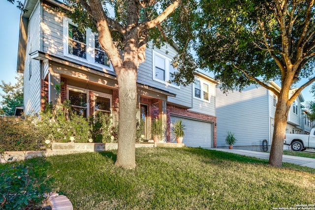 contemporary home featuring a front lawn and a garage