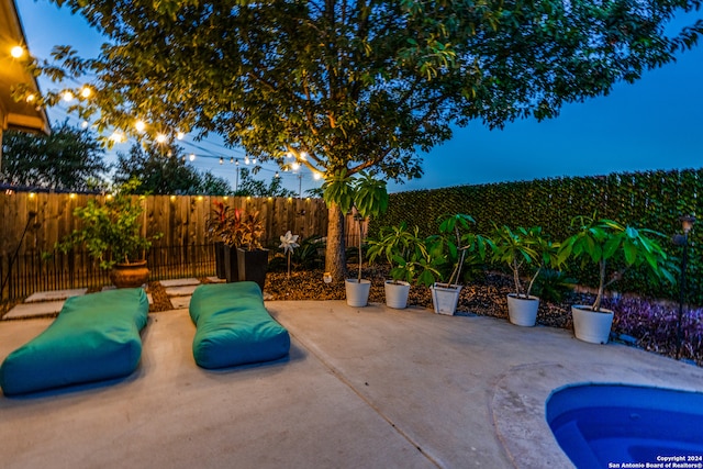 view of patio / terrace featuring a jacuzzi