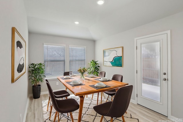 dining area with light wood-type flooring, baseboards, and recessed lighting