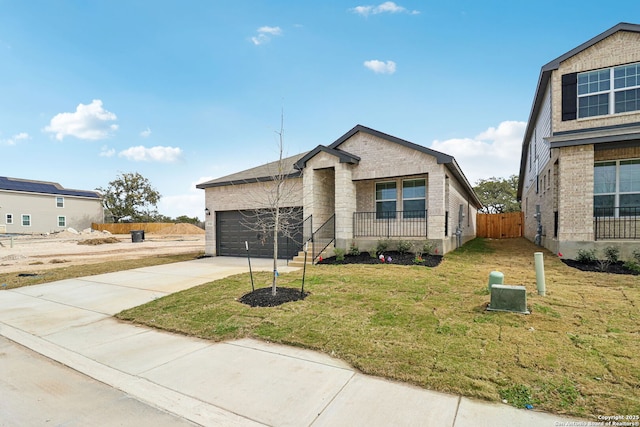 5728 Sendero Rnch, San Antonio, TX 78253 - view of front of home featuring a garage, driveway, and brick siding