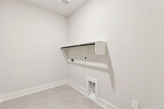 laundry room with hookup for a gas dryer, hookup for a washing machine, and electric dryer hookup