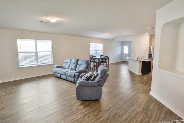 living room featuring dark hardwood / wood-style flooring