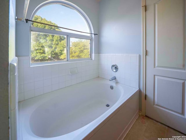 bathroom with a bathing tub