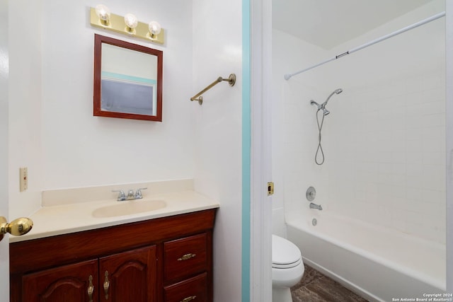 full bathroom with tile patterned flooring, vanity, toilet, and tiled shower / bath