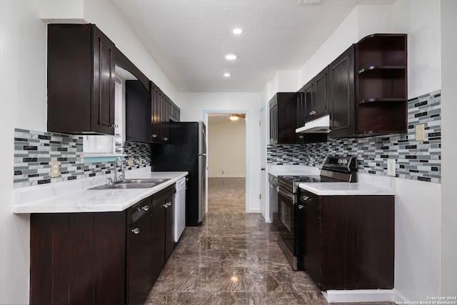 kitchen with black electric range, dark brown cabinets, a textured ceiling, and sink