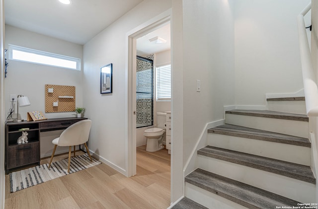 office space featuring light hardwood / wood-style flooring and plenty of natural light