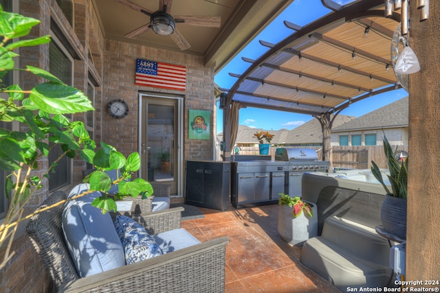 view of patio featuring an outdoor living space, area for grilling, ceiling fan, and exterior kitchen