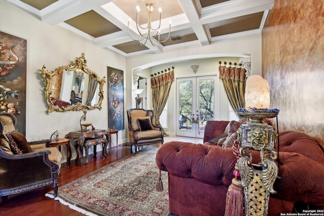 315 Dona Ana Cv, Helotes, TX 78023 - living room with a chandelier, french doors, coffered ceiling, wood finished floors, and beam ceiling