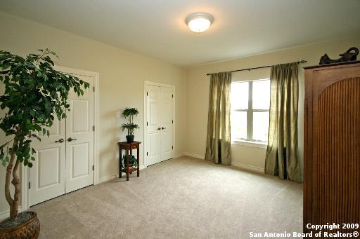 interior space featuring light colored carpet