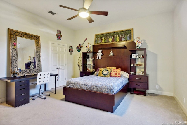 carpeted bedroom with ceiling fan