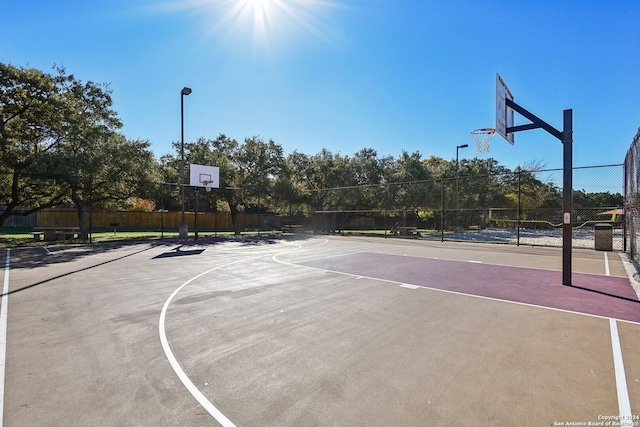 view of basketball court with tennis court