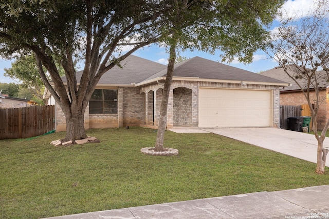 ranch-style house with a garage and a front lawn