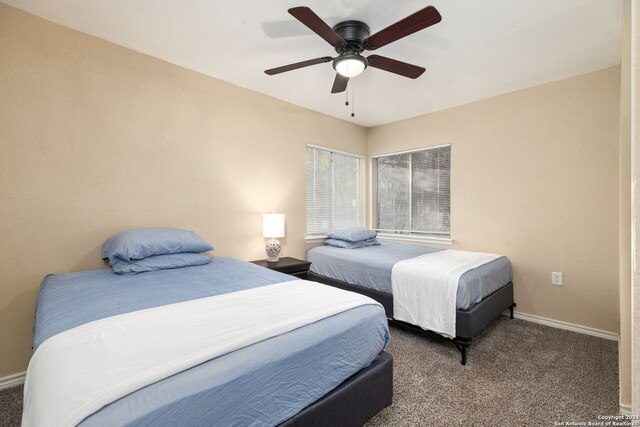 bedroom featuring carpet and ceiling fan