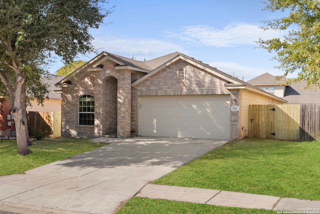 ranch-style home with a front yard and a garage