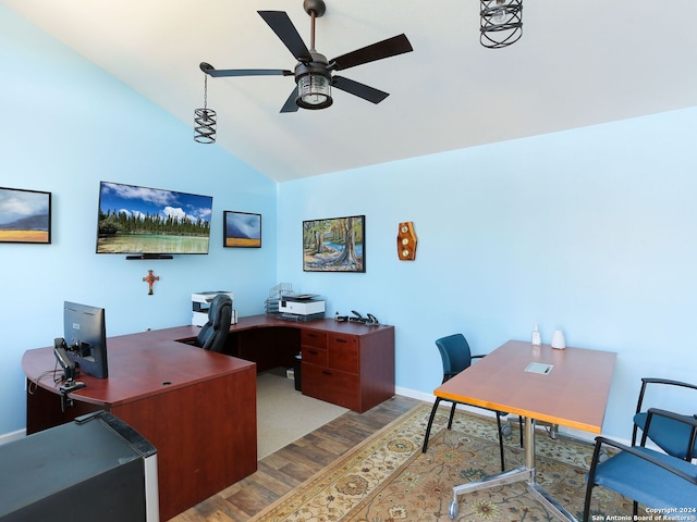 home office with ceiling fan, wood-type flooring, and vaulted ceiling