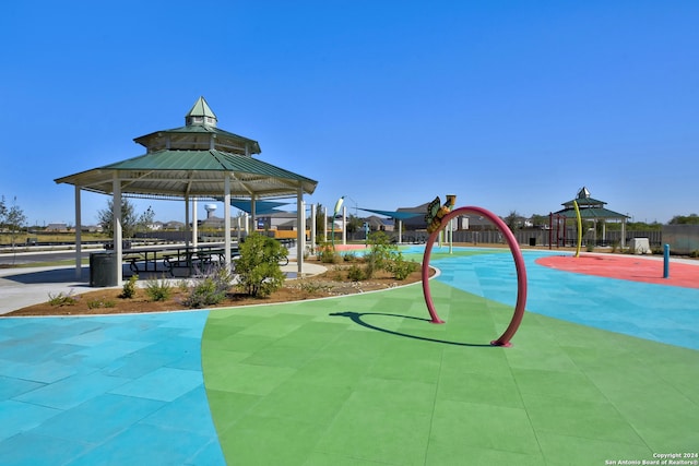 view of community featuring a gazebo and a playground