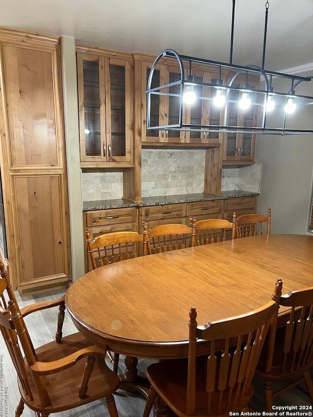 dining area featuring wood finished floors