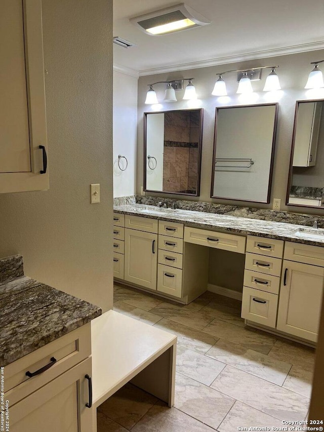 full bath featuring visible vents, ornamental molding, and vanity